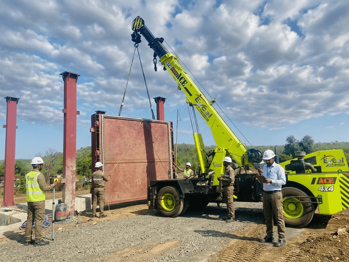 ACE 4x4 Excel Engineering crane lifting large steel panel